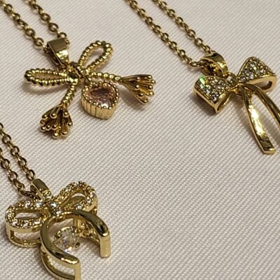 Collar Surtido Moño Dorado